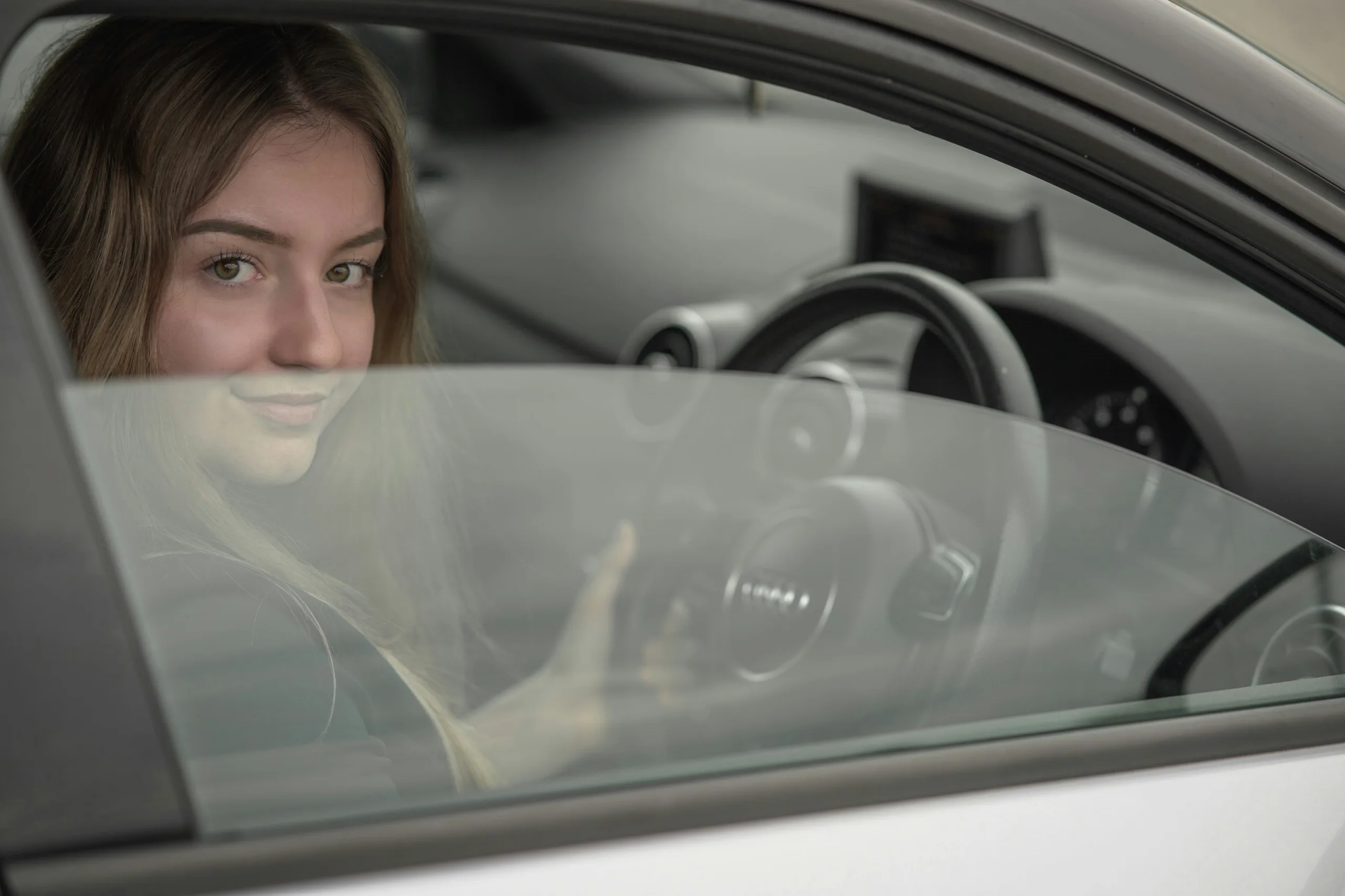 Student in Her Car