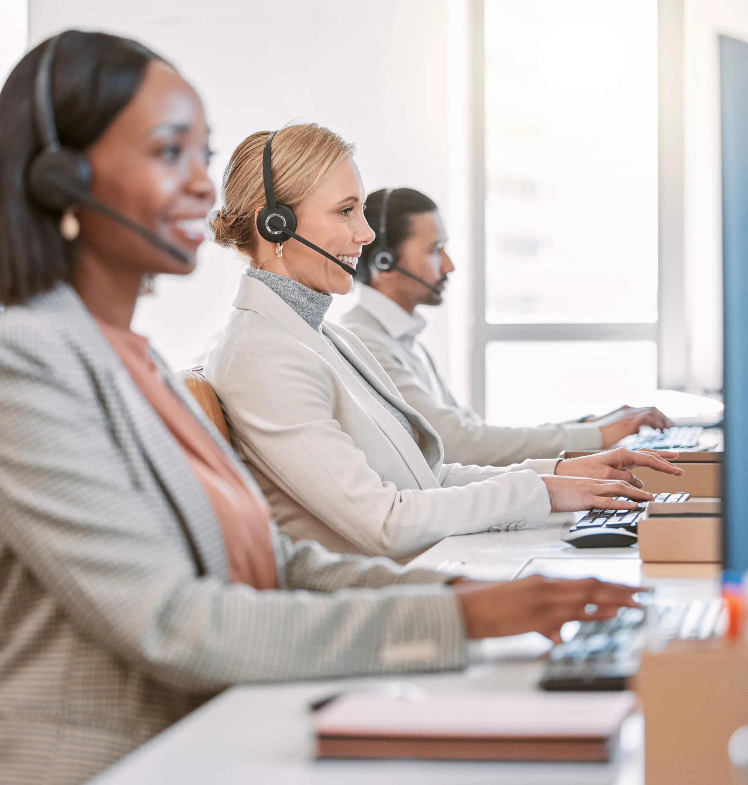 Customer support agents at their desks